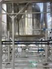 Used Sprinkman Stainless Steel Agitated Pressure Tank,  Approximate 3,767 Gallon. Internal rated 45/FV psi at -20 to 350 degrees F. 304 stainless steel, vertical, slight dished top and cone bottom.  ...