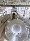 Used Sprinkman Stainless Steel Agitated Pressure Tank,  Approximate 3,767 Gallon. Internal rated 45/FV psi at -20 to 350 degrees F. 304 stainless steel, vertical, slight dished top and cone bottom.  ...