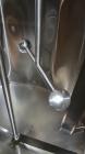 Used Walker Stainless Mix Tank, 1500 Gallon, 304 Stainless Steel, Vertical. Approximate 84