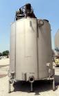 Used Walker Stainless Tank, 4700 Gallon, 304 Stainless Steel, Vertical. Approximate 108” diameter x 120” straight side, coned top, flat bottom. Top entering agitator, with an anchor style blade with ...