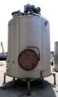 Used Walker Stainless Tank, 4700 Gallon, 304 Stainless Steel, Vertical. Approximate 108” diameter x 120” straight side, coned top, flat bottom. Top entering agitator, with an anchor style blade with ...