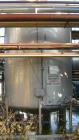 USED: Walker 3,500 gallon, type 304L stainless steel, storage tank. Vertical, dished heads. Approximate 8' diameter x 10' straight side. Misc top and side flanged openings. Side openings include an 1...