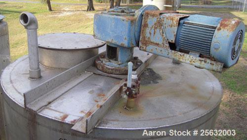 Used Tank, Approximately 500 Gallons, Stainless Steel, Vertical. 60" diameter x 48" straight side. Flat top, dish bottom. 2" diameter shaft with a 4 blade turbine, driven by an approximate 3 hp motor...