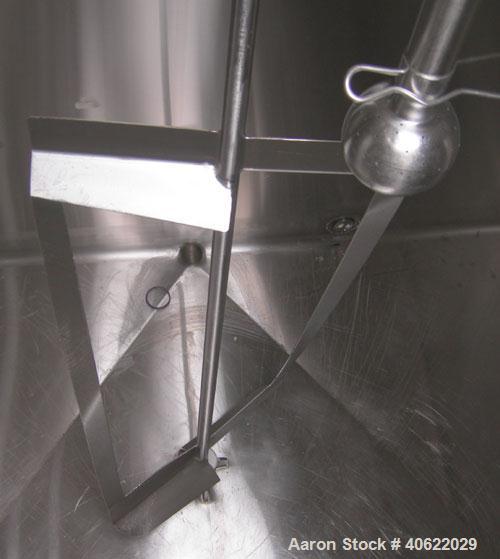 Used Flavor tank, (3) compartment, approximate 600 gallon each, 304 stainless steel.  Each compartment measures 43" x 64" x approx 52" deep.  V shaped top, sloped bottom.  Each compartment is equippe...