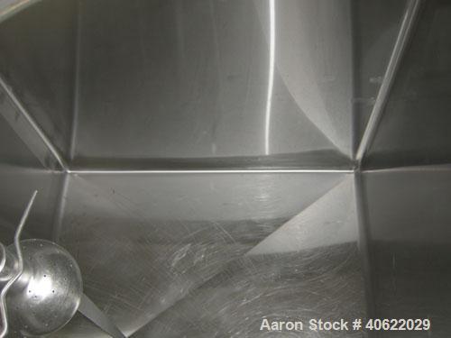 Used Flavor tank, (3) compartment, approximate 600 gallon each, 304 stainless steel.  Each compartment measures 43" x 64" x approx 52" deep.  V shaped top, sloped bottom.  Each compartment is equippe...