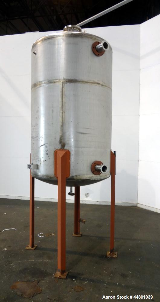 Used Par Piping & Fabrication Tank, 600 Gallon, 321 Stainless Steel, Vertical. 48" Diameter x 72" straight side, dished top and bottom. Openings top 3", 8"; side 2", 3". 1" Center bottom outlet. Moun...
