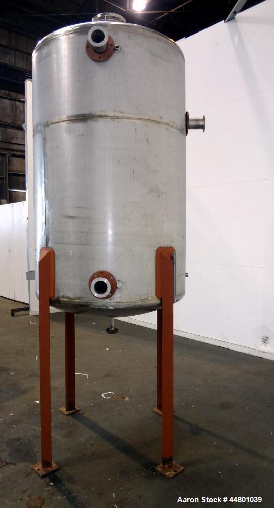 Used Par Piping & Fabrication Tank, 600 Gallon, 321 Stainless Steel, Vertical. 48" Diameter x 72" straight side, dished top and bottom. Openings top 3", 8"; side 2", 3". 1" Center bottom outlet. Moun...