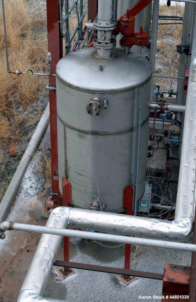 Used Par Piping & Fabrication Tank, 600 Gallon, 321 Stainless Steel, Vertical. 48" Diameter x 72" straight side, dished top and bottom. Openings top 3", 8"; side 2", 3". 1" Center bottom outlet. Moun...