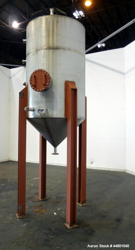 Used Par Piping & Fabrication Tank, 575 Gallon, 321 Stainless Steel, Vertical. 48" Diameter x 72" straight side, coned top & bottom. Openings top 3", 8", 1"; side (2) 2", 12" with cover. 2" Center bo...
