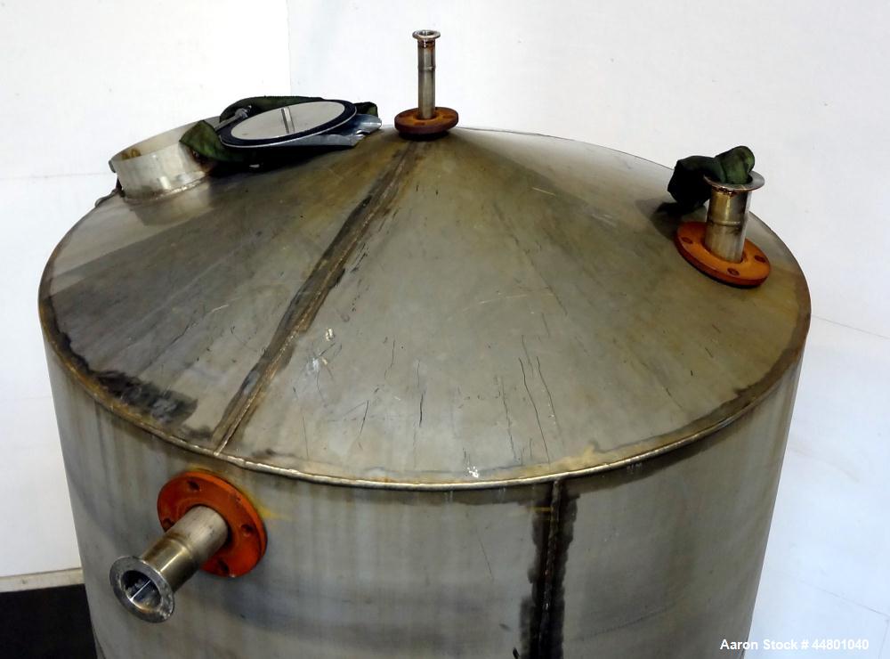 Used Par Piping & Fabrication Tank, 575 Gallon, 321 Stainless Steel, Vertical. 48" Diameter x 72" straight side, coned top & bottom. Openings top 3", 8", 1"; side (2) 2", 12" with cover. 2" Center bo...