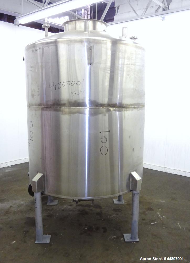 Used Tank, 575 Gallon, 316 Stainless Steel, Vertical. Approximate 54" diameter x 58" straight side, dished top, coned bottom. Openings top (2)1", (2) 2", 3", 19" man way with cover. 2" Center bottom ...