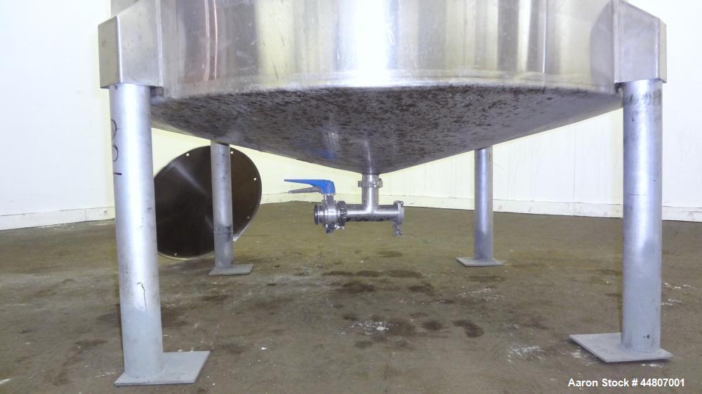 Used Tank, 575 Gallon, 316 Stainless Steel, Vertical. Approximate 54" diameter x 58" straight side, dished top, coned bottom. Openings top (2)1", (2) 2", 3", 19" man way with cover. 2" Center bottom ...