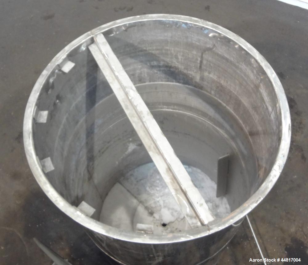 Used Tank, 550 Gallons, 304 Stainless Steel, Vertical. Approximately 48" diameter x 72" straight side. Flat open top with a plastic cover, coned bottom. Top entering clamp on agitator, 3/4" diameter ...