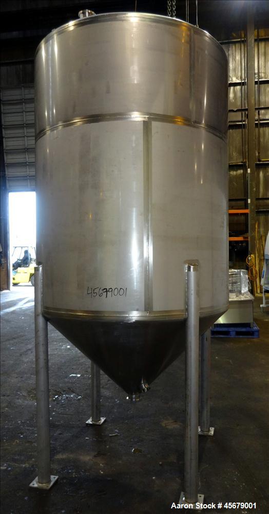 Used MFI Industries Tank, 900 Gallon, 316 Stainless Steel, Vertical. 60" Diameter x 74" straight side. Dished top, coned bottom. Openings: top (6) 4", 18" man way with cover, 4" center bottom outlet....
