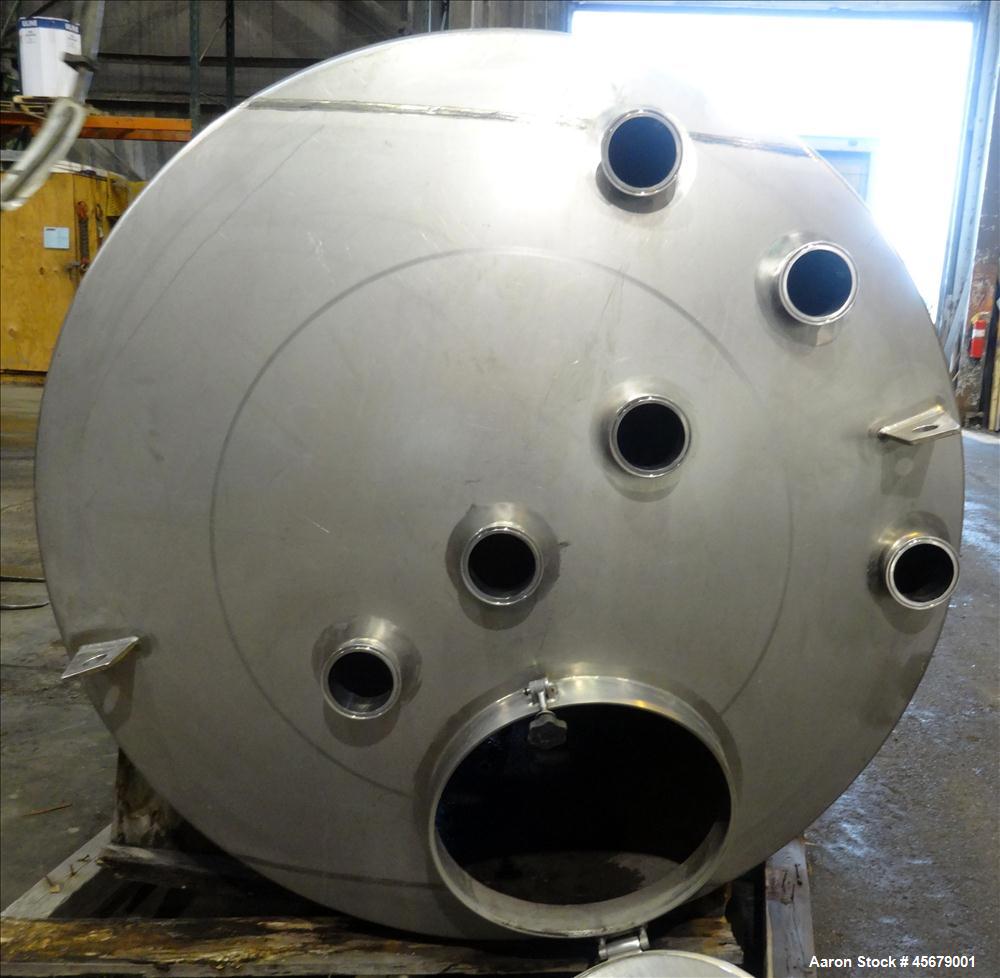 Used MFI Industries Tank, 900 Gallon, 316 Stainless Steel, Vertical. 60" Diameter x 74" straight side. Dished top, coned bottom. Openings: top (6) 4", 18" man way with cover, 4" center bottom outlet....