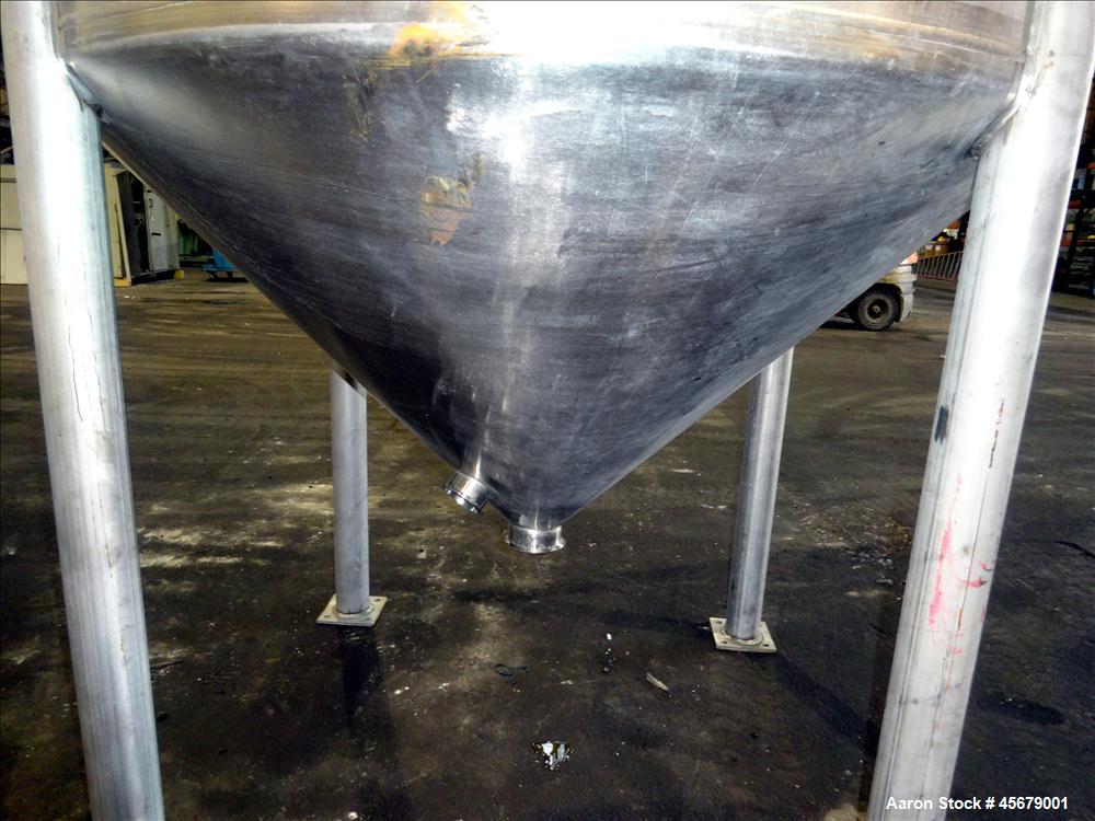 Used MFI Industries Tank, 900 Gallon, 316 Stainless Steel, Vertical. 60" Diameter x 74" straight side. Dished top, coned bottom. Openings: top (6) 4", 18" man way with cover, 4" center bottom outlet....