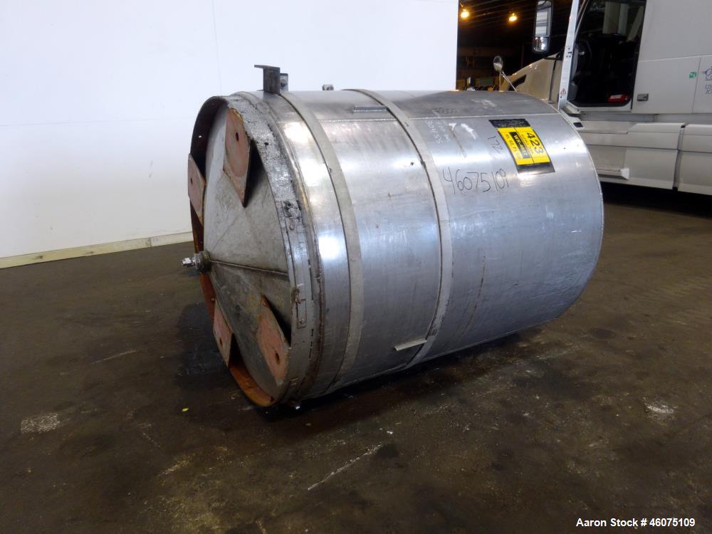 Used Tank, Approximate 650 Gallon, 304 Stainless Steel, Vertical. Approximate 55" diameter x 59" straight side, coned top & bottom. Openings Top: 20" man way with hinged cover, (4) 2", (3) 1". Side: ...