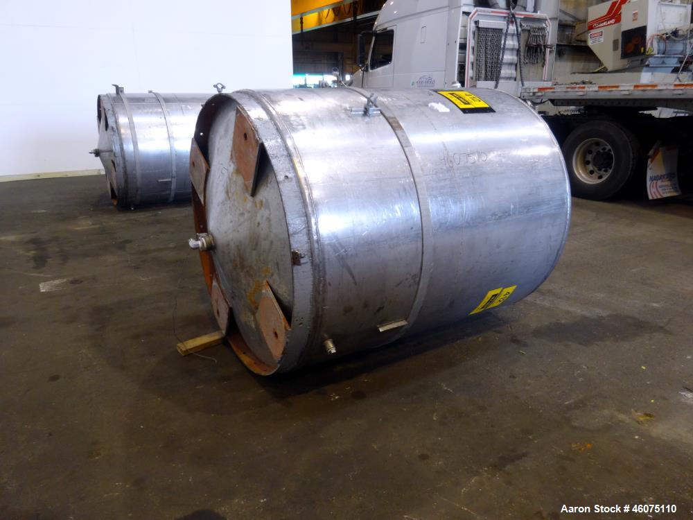 Used Tank, Approximate 650 Gallon, 304 Stainless Steel, Vertical. Approximate 55" diameter x 58" straight side, coned top & bottom. Openings top: 20" man way with hinged cover, (4) 2", (3) 1". Side: ...