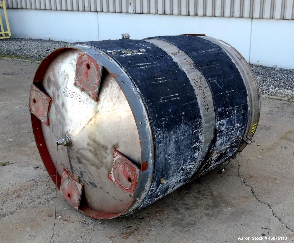 Used Tank, 650 Gallon, 304 Stainless Steel, Vertical. Approximate 52" diameter x 60" straight side, coned top & bottom. Openings top 17-3/4" man way with hinged cover, (4) 2" threaded, 2" center bott...