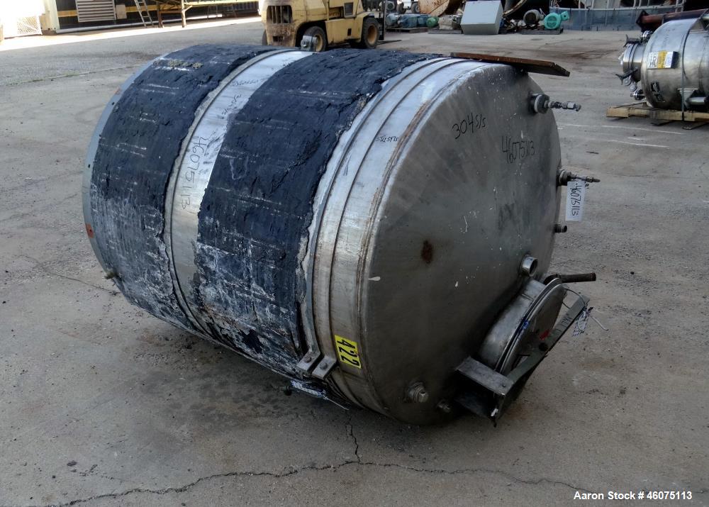Used Tank, 650 Gallon, 304 Stainless Steel, Vertical. Approximate 52" diameter x 60" straight side, coned top & bottom. Openings top 17-3/4" man way with hinged cover, (4) 2" threaded, 2" center bott...