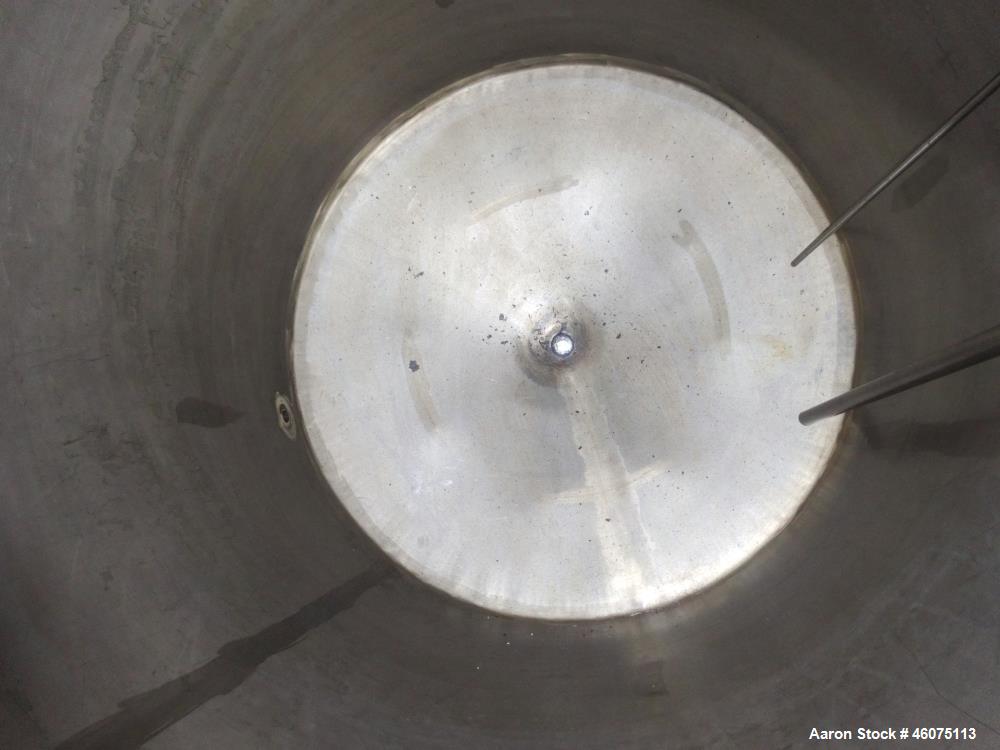 Used Tank, 650 Gallon, 304 Stainless Steel, Vertical. Approximate 52" diameter x 60" straight side, coned top & bottom. Openings top 17-3/4" man way with hinged cover, (4) 2" threaded, 2" center bott...