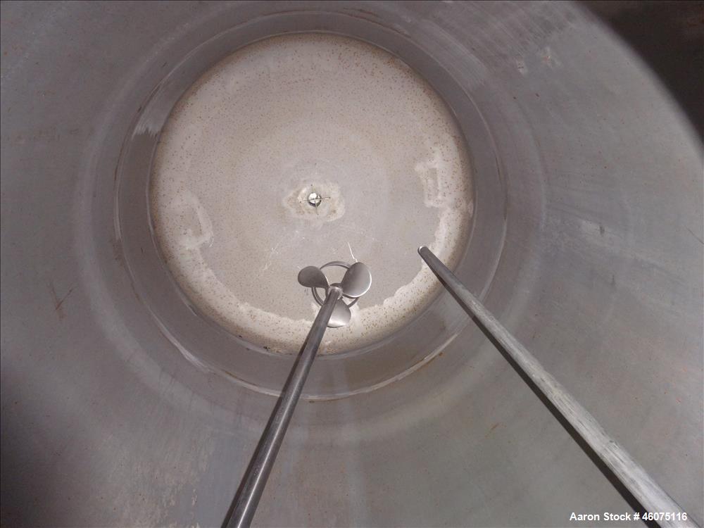 Used Tank, 500 Gallon, 304 Stainless Steel, Vertical. Approximate 48" diameter x 60" straight side, dished top and bottom. Off center top entering air operated Lightnin agitator, model EKXJAC-100, se...