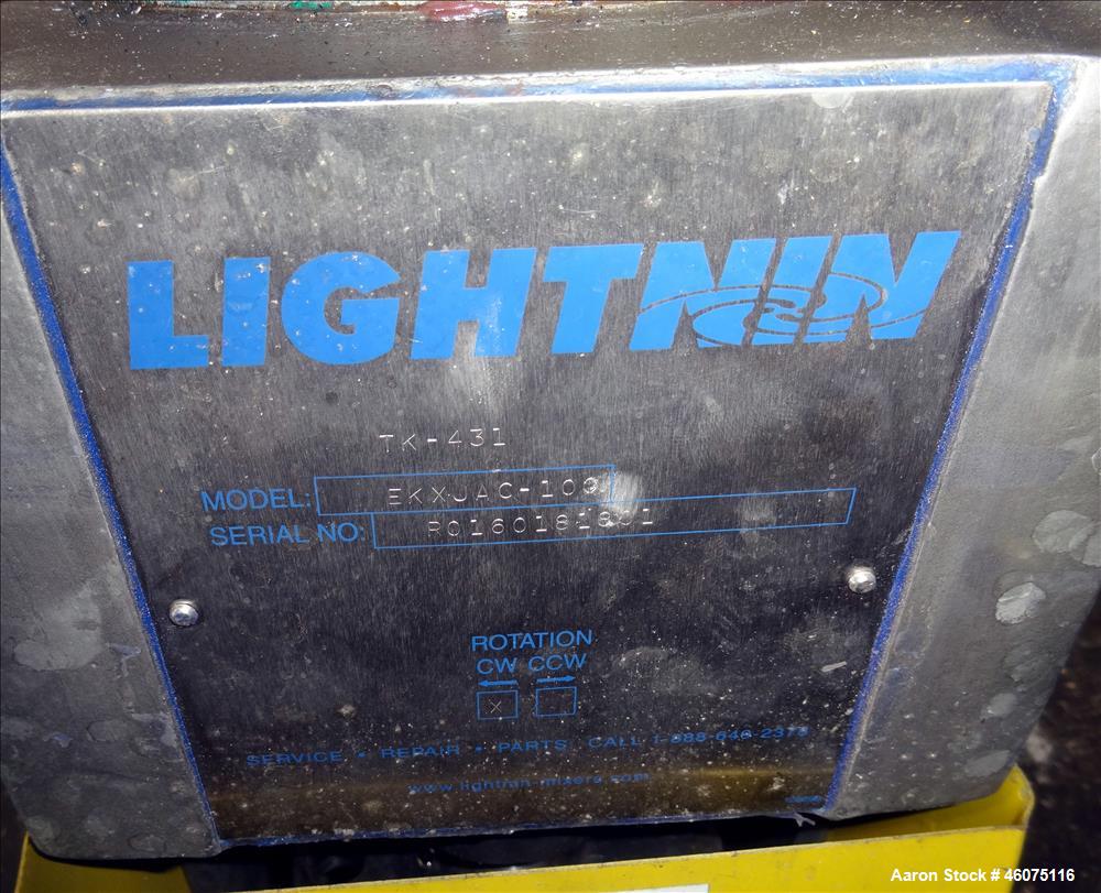 Used Tank, 500 Gallon, 304 Stainless Steel, Vertical. Approximate 48" diameter x 60" straight side, dished top and bottom. Off center top entering air operated Lightnin agitator, model EKXJAC-100, se...