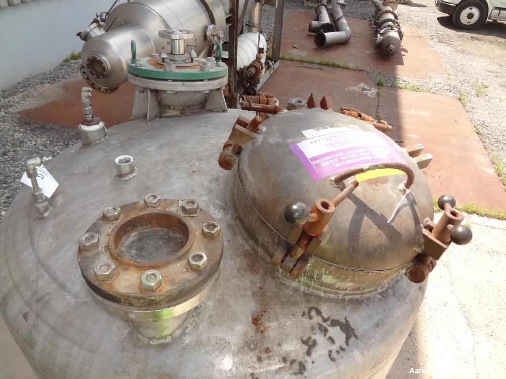 Used Tank, 500 Gallon, 304 Stainless Steel, Vertical. Approximate 48" diameter x 60" straight side, dished top & bottom. Off center Lightnin agitator, model EKXJC-174, serial# 90/547709. (2) 3 Blade ...