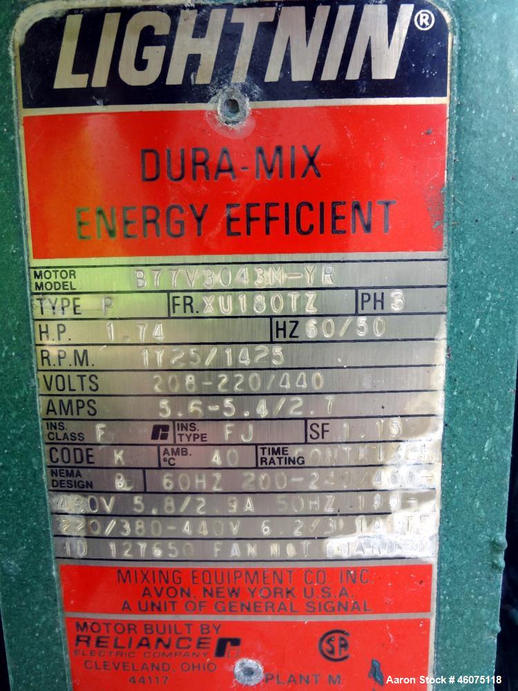 Used Tank, 500 Gallon, 304 Stainless Steel, Vertical. Approximate 48" diameter x 60" straight side, dished top & bottom. Off center Lightnin agitator, model EKXJC-174, serial# 90/547709. (2) 3 Blade ...