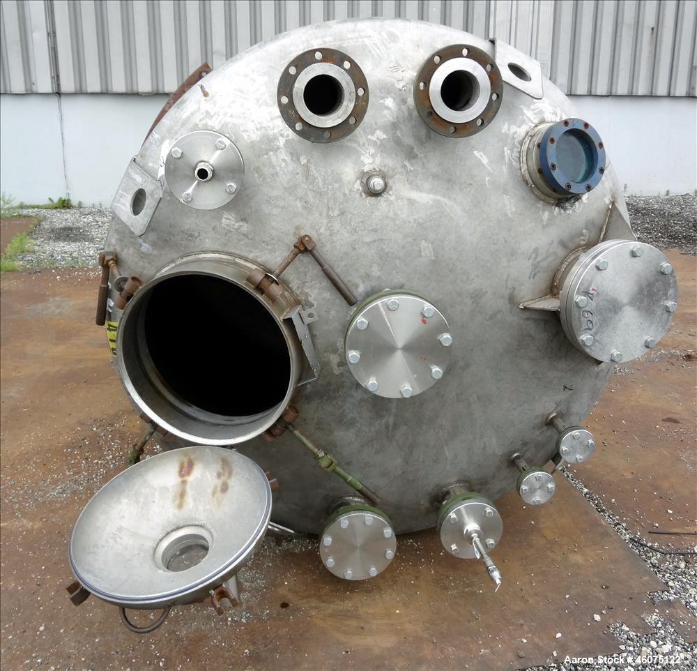 Used Tank, 975 Gallon, 316 Stainless Steel, Vertical. Approximate 66" diameter x 60" Straight side, dished top/bottom. Top openings: (3) 4", (2) 3", (20) 1", 6", 6" sight glass, 8", 20" man way with ...