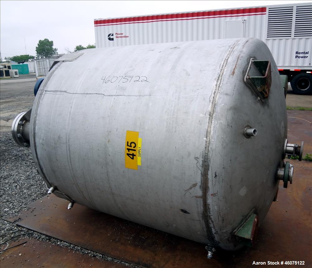Used Tank, 975 Gallon, 316 Stainless Steel, Vertical. Approximate 66" diameter x 60" Straight side, dished top/bottom. Top openings: (3) 4", (2) 3", (20) 1", 6", 6" sight glass, 8", 20" man way with ...