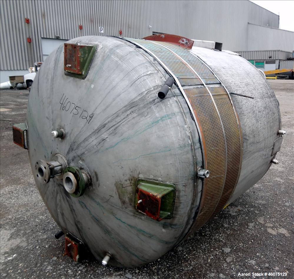 Used Tank, 975 Gallon, 316 Stainless Steel, Vertical. Approximate 66" diameter x 60" straight side, dished top & bottom. Top openings: 20" manway with cover with 4" sight glass, 6", 8", (2) 3", (3) 4...