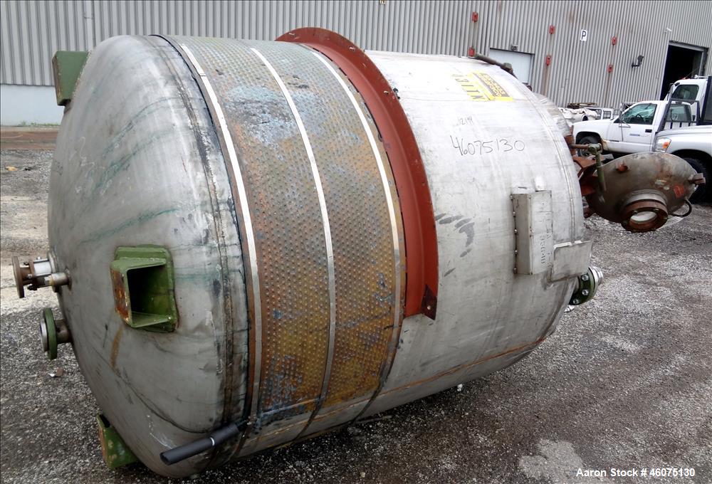Used Tank, 975 Gallon, 316 Stainless Steel, Vertical. Approximate 66" diameter x 60" straight side, dished top/bottom. Top openings: (2) 3", (3 )4", (2) 1", 6", 6" sight glass, 8", 20" manway with co...