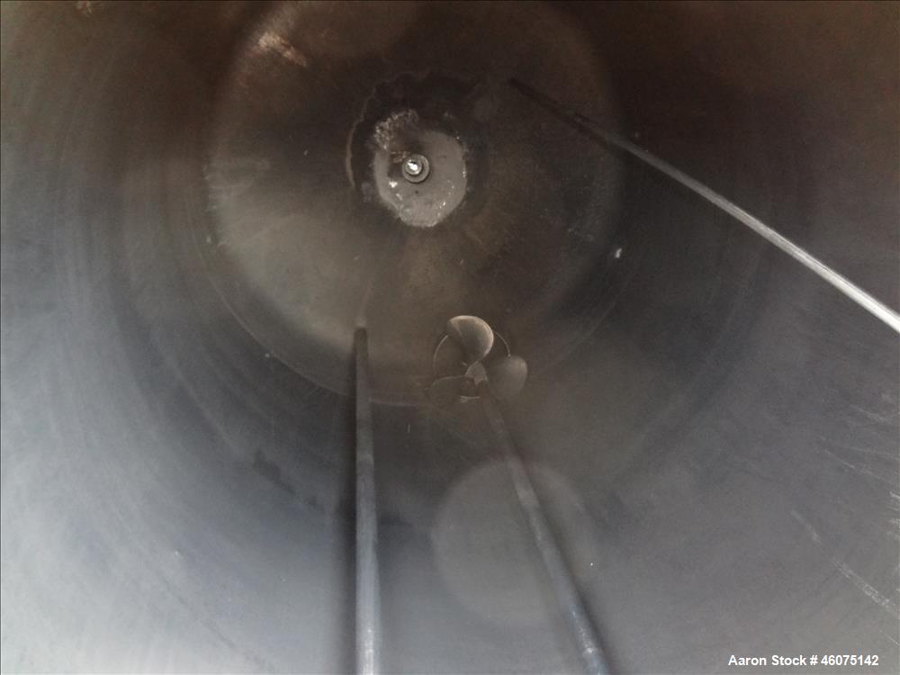 Used Tank, 500 Gallon, 304 Stainless Steel, Vertical. Approximate 48" diameter x 60" straight side, dished top & bottom. Off center top entering Lightnin agitator. Shaft and prop, driven by an approx...