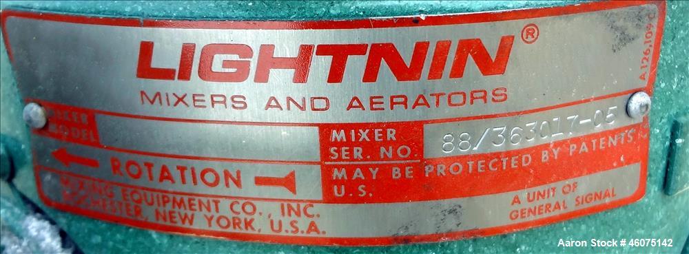 Used Tank, 500 Gallon, 304 Stainless Steel, Vertical. Approximate 48" diameter x 60" straight side, dished top & bottom. Off center top entering Lightnin agitator. Shaft and prop, driven by an approx...