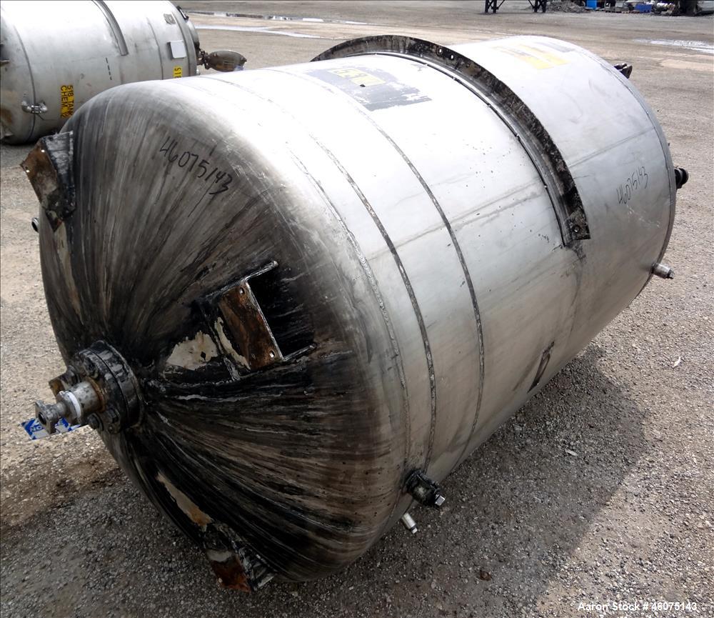Used Tank, 500 Gallon, 304 Stainless Steel, Vertical. Approximate 48" diameter x 60" straight side, dished top & bottom. Off center top entering Lightnin agitator serial number 88/363017-03. Shaft an...