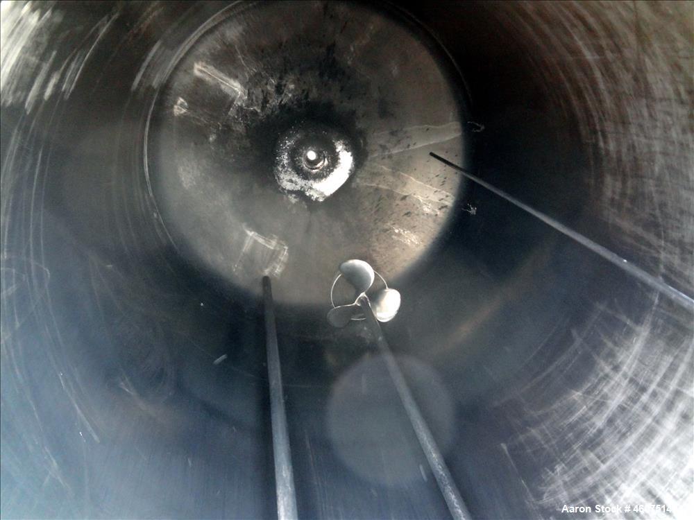 Used Tank, 500 Gallon, 304 Stainless Steel, Vertical. Approximate 48" diameter x 60" straight side, dished top & bottom. Off center top entering Lightnin agitator serial number 88/363017-03. Shaft an...