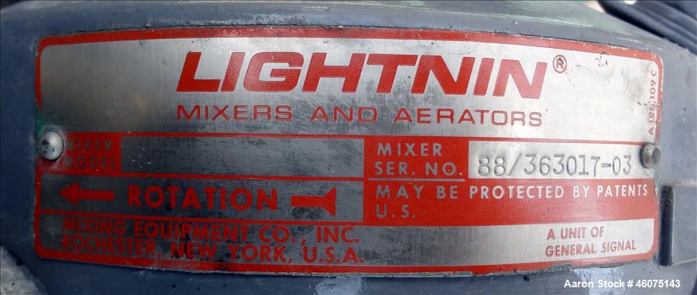 Used Tank, 500 Gallon, 304 Stainless Steel, Vertical. Approximate 48" diameter x 60" straight side, dished top & bottom. Off center top entering Lightnin agitator serial number 88/363017-03. Shaft an...
