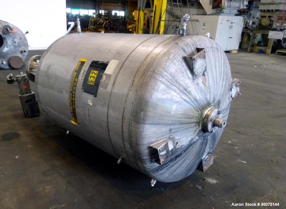 Used Tank, 500 Gallon, 304 Stainless Steel, Vertical. Approximate 48" diameter x 60" straight side, dished top and bottom. Off center top entering Lightnin agitator, model XJSS-117, serial# R02408943...