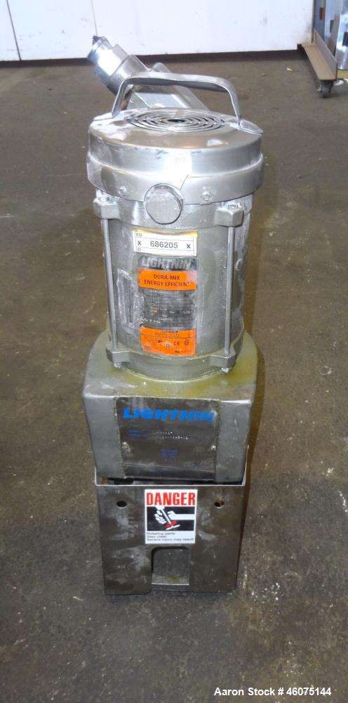 Used Tank, 500 Gallon, 304 Stainless Steel, Vertical. Approximate 48" diameter x 60" straight side, dished top and bottom. Off center top entering Lightnin agitator, model XJSS-117, serial# R02408943...