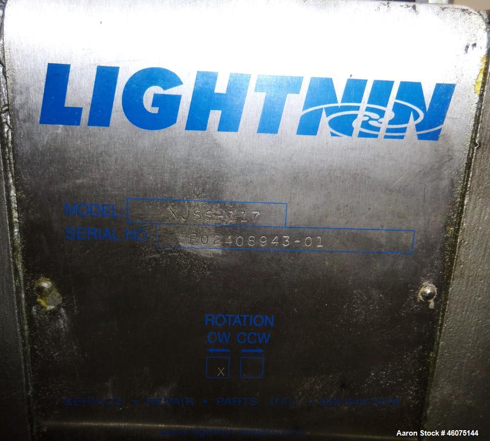Used Tank, 500 Gallon, 304 Stainless Steel, Vertical. Approximate 48" diameter x 60" straight side, dished top and bottom. Off center top entering Lightnin agitator, model XJSS-117, serial# R02408943...