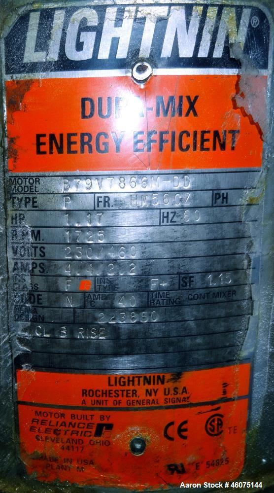 Used Tank, 500 Gallon, 304 Stainless Steel, Vertical. Approximate 48" diameter x 60" straight side, dished top and bottom. Off center top entering Lightnin agitator, model XJSS-117, serial# R02408943...