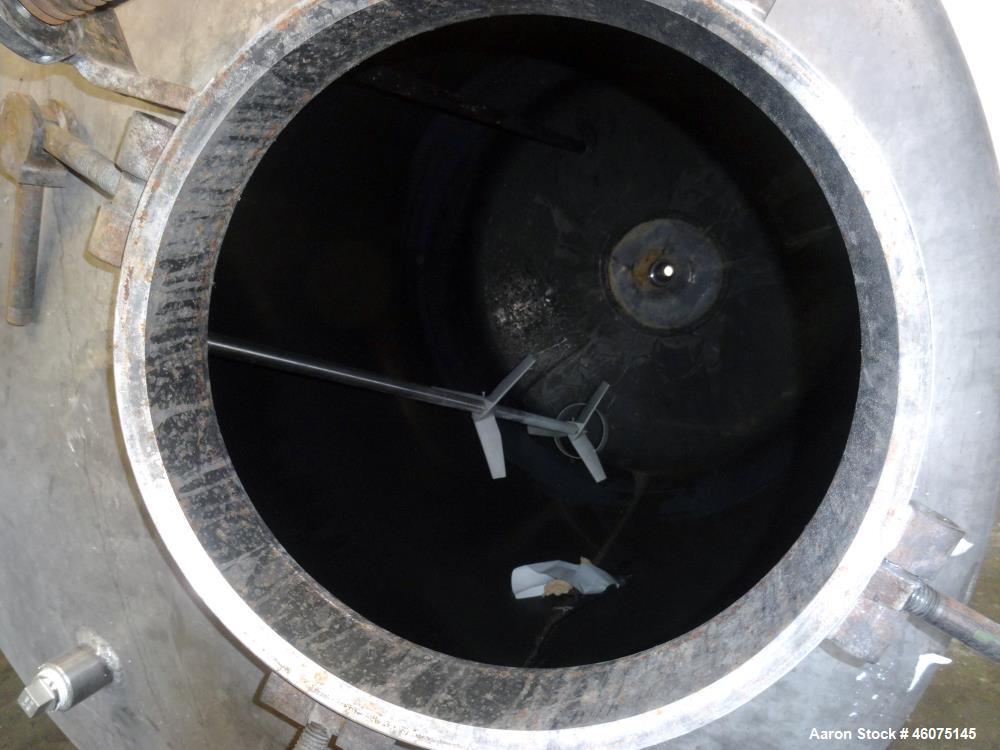Used Tank, 500 Gallon, 304 Stainless Steel, Vertical. Approximate 48" diameter x 60" straight side, dished top and bottom. Off center top entering Lightnin agitator, model EKXJSS-117, serial# 97/0125...