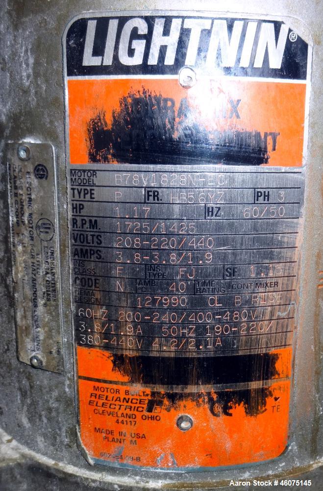 Used Tank, 500 Gallon, 304 Stainless Steel, Vertical. Approximate 48" diameter x 60" straight side, dished top and bottom. Off center top entering Lightnin agitator, model EKXJSS-117, serial# 97/0125...