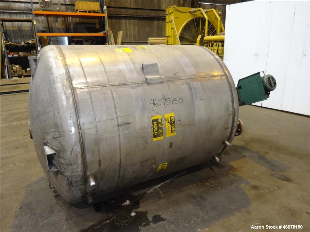 Used Tank, 800 Gallon, 304 Stainless Steel, Vertical. Approximate 60" diameter x 60" straight side, dished top & bottom. Top entering Lightnin agitator, model 71-C-3, serial# 7900275, ratio 9.33 to 1...