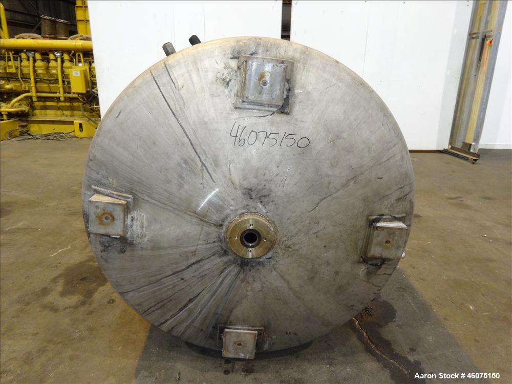 Used Tank, 800 Gallon, 304 Stainless Steel, Vertical. Approximate 60" diameter x 60" straight side, dished top & bottom. Top entering Lightnin agitator, model 71-C-3, serial# 7900275, ratio 9.33 to 1...