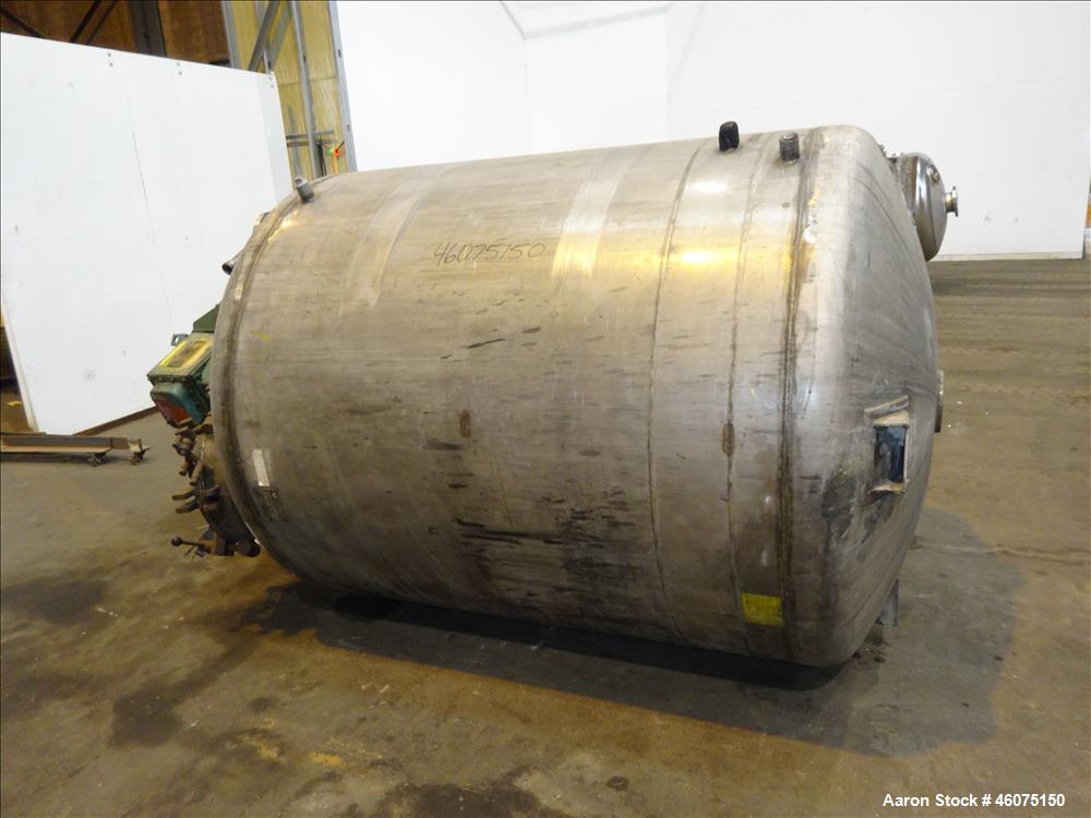 Used Tank, 800 Gallon, 304 Stainless Steel, Vertical. Approximate 60" diameter x 60" straight side, dished top & bottom. Top entering Lightnin agitator, model 71-C-3, serial# 7900275, ratio 9.33 to 1...