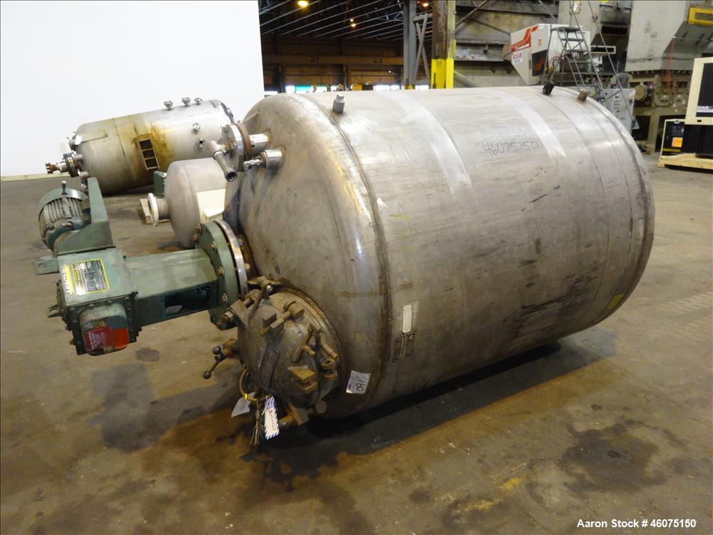 Used Tank, 800 Gallon, 304 Stainless Steel, Vertical. Approximate 60" diameter x 60" straight side, dished top & bottom. Top entering Lightnin agitator, model 71-C-3, serial# 7900275, ratio 9.33 to 1...