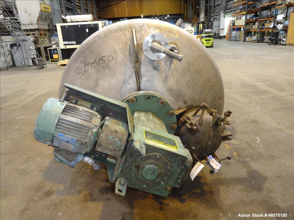 Used Tank, 800 Gallon, 304 Stainless Steel, Vertical. Approximate 60" diameter x 60" straight side, dished top & bottom. Top entering Lightnin agitator, model 71-C-3, serial# 7900275, ratio 9.33 to 1...