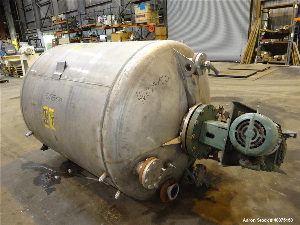 Used Tank, 800 Gallon, 304 Stainless Steel, Vertical. Approximate 60" diameter x 60" straight side, dished top & bottom. Top entering Lightnin agitator, model 71-C-3, serial# 7900275, ratio 9.33 to 1...